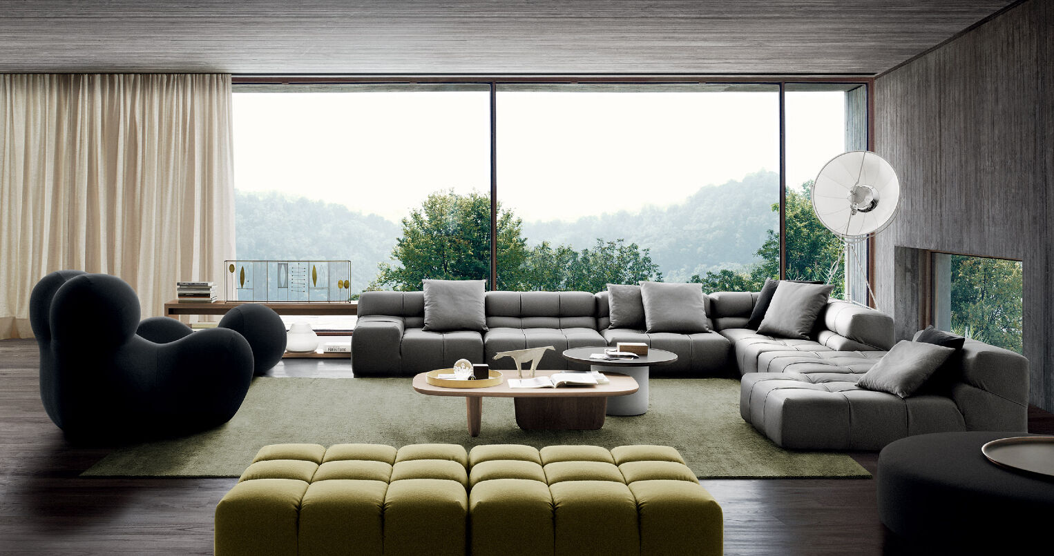 Living room with B&B Italia products: Serie Up armchair, Tufty-time sofas in different fabrics, tobi-ishi coffee table