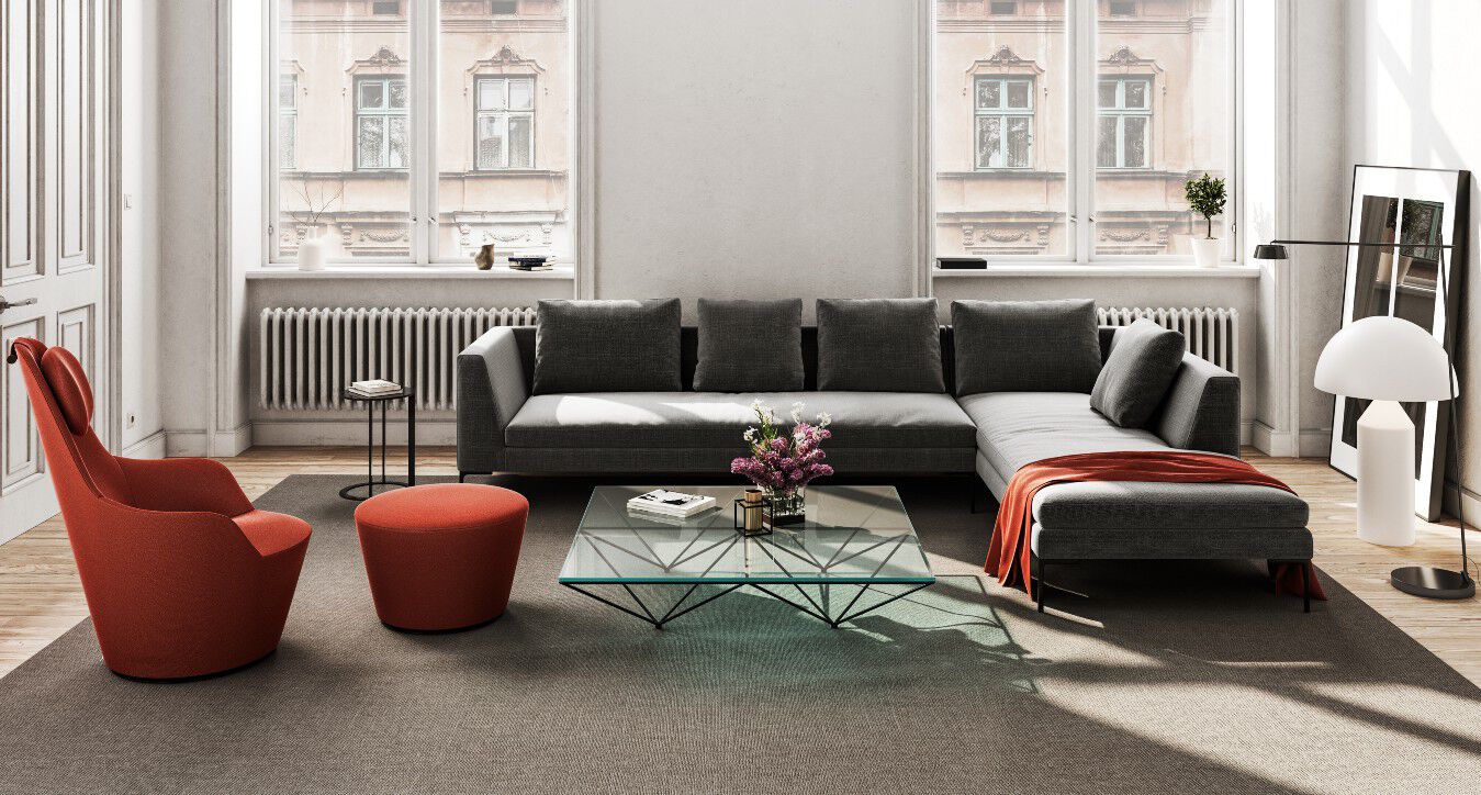 Charles sofa by Antonio Citterio in a city setting. 