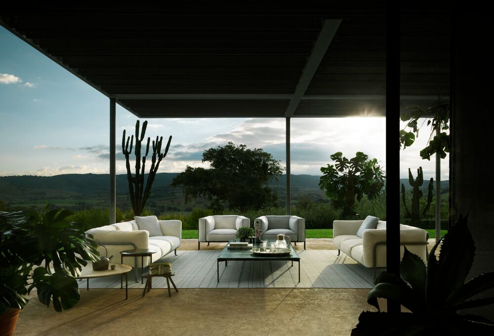 Explore the outdoor collections by B&B Italia. In the picture Borea Collection.