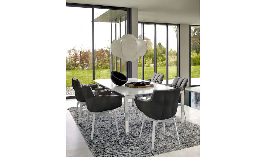 Husk armchair with welcoming backrest by B&B Italia, design by